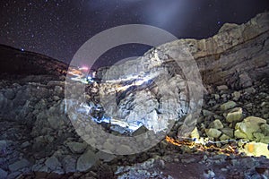 Night climbing a cliff, Kawah Ijen Volcano