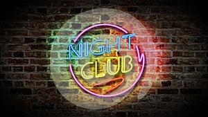 NIGHT CLUB sign on a brick wall background