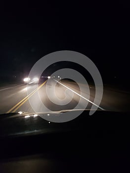 Night driving on a two lane rural road