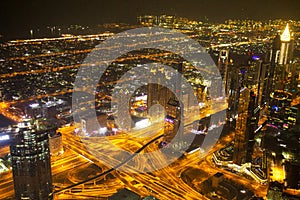 Night Dubai city, United Arab Emirates, aerial view