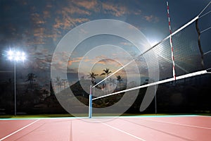 Night empty professional volleyball open air court with net