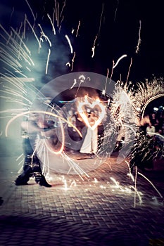 Night fire show at the wedding