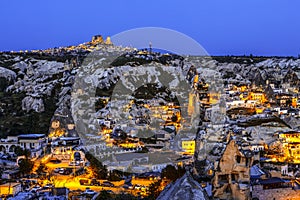 The night Goreme, ancient city and fortress of Uchisar on the horizon. Landscape Cappadocia