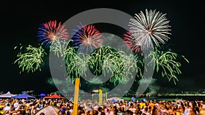 Night image with New Year`s Eve RÃÂ©veillon fireworks exploding in the sky.