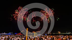 Night image with New Year`s Eve RÃÂ©veillon fireworks exploding in the sky.