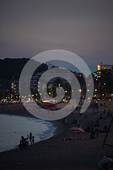 Night image of some buildings in a coastal city photo