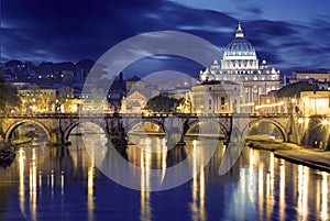 Night image of St. Peter's Basilica, Ponte Sant Angelo and Tiber