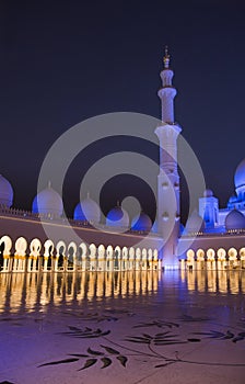 Night image of a Tower at the stunning Sheikh Zayed Grand Mosque in Abu Dhabi UAE