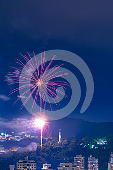 Night images with New Year`s Reveillon fireworks exploding in the sky. Event held for the 2022 arrival in Niteroi, Rio de