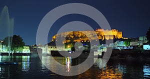 Night Jodhpur city view of lake and Mehrangarh Fort. Rajasthan, India