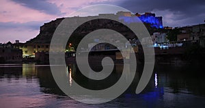 Night Jodhpur: view of lake with fontain and Mehrangarh Fort. Rajasthan, India