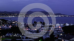 Night landscape of the beautiful Marina Baie des Anges on against the backdrop of the Mediterranean sea and the Nice city