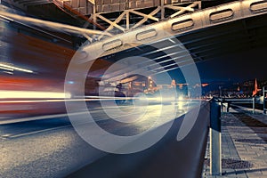 Night landscape in Budapest, view of the river, the bridge and the night lights of the city