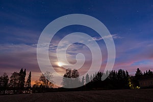 Night landscape and cloudy starry sky