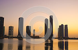 Night landscape of the embankment of the emirate of Sharjah, United Arab Emirates