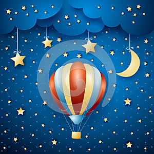 Night landscape with hot air balloon