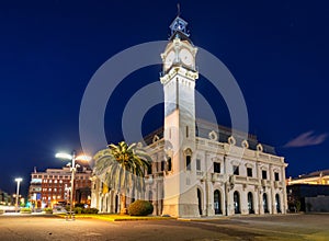 Night landscape of the Port of Valencia with the clock tower, Spain