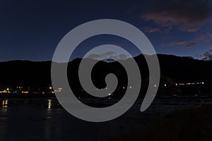 A night landscape of Togetsukyo bridge in Kyoto in autumn wide shot