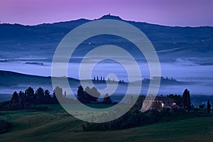 Night landscape in Tuscany, near lthe Siana and Pienza, Sunrise morning in Italy. Idyllic view on hilly meadow in Tuscany in