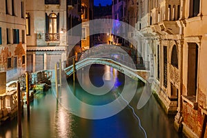 Night lateral canal and bridge in Venice, Italy