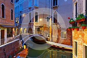 Night lateral canal and bridge in Venice, Italy