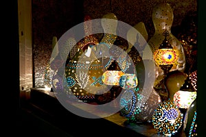 Night-light dotted colourful lamps on a dark background photo