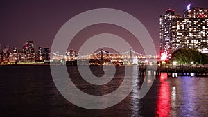 Night light queensboro bridge gantry plaza park panorama 4k time lapse new york