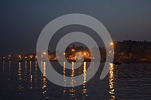 Night Light Reflections in The Ganges River in Varanasi, India