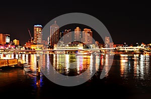 Night lights at Brisbane city reflecting in river