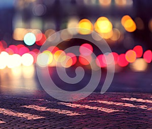 Night lights in city and zebra crossing