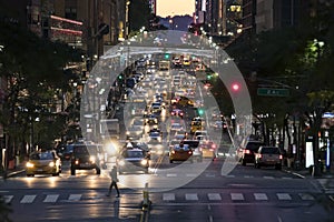 Night lights of crosstown traffic on 42nd Street in New York City