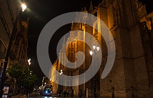 Night lights illuminate the cathedral of seville in andalusia, spain