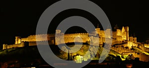 Night lights on the ramparts and castle towers of medieval Carcassonne