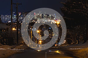 Night long exposure shot of winter in city with glowinglights