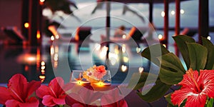 night Luxury resort poool glasses of wine and candles with tropic roses flowers spa relaxing background