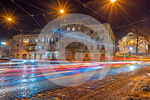 Night Lviv old city architecture in the winter season. Buildings highlighted by the illumination