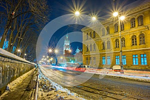 Night Lviv old city architecture in the winter season. Buildings highlighted by the illumination