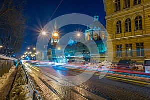 Night Lviv old city architecture in the winter season. Buildings highlighted by the illumination