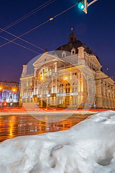 Night Lviv old city architecture in the winter season. Buildings highlighted by the illumination