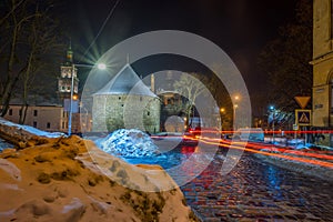 Night Lviv old city architecture in the winter season. Buildings highlighted by the illumination