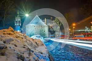 Night Lviv old city architecture in the winter season. Buildings highlighted by the illumination