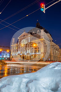 Night Lviv old city architecture in the winter season. Buildings highlighted by the illumination