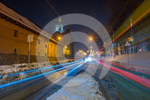 Night Lviv old city architecture in the winter season. Buildings highlighted by the illumination