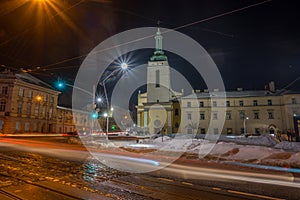 Night Lviv old city architecture in the winter season. Buildings highlighted by the illumination