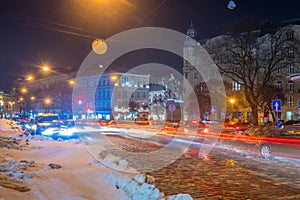 Night Lviv old city architecture in the winter season. Buildings highlighted by the illumination