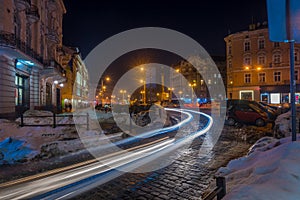 Night Lviv old city architecture in the winter season. Buildings highlighted by the illumination