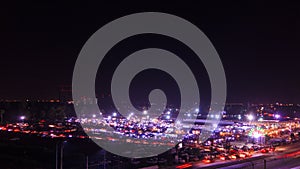 Night market in Bangkok Thailand, a carnival like atmosphere with a huge array of goods to browse, and snacks, bars and live music