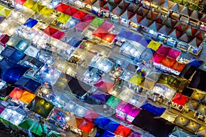 Night market with colorful tent