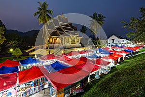 Night market and Haw Pha Bang temple in Luang Prabang