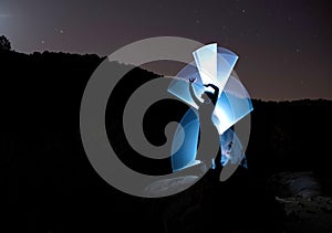 Night model in mountain scenery and illuminated with lights